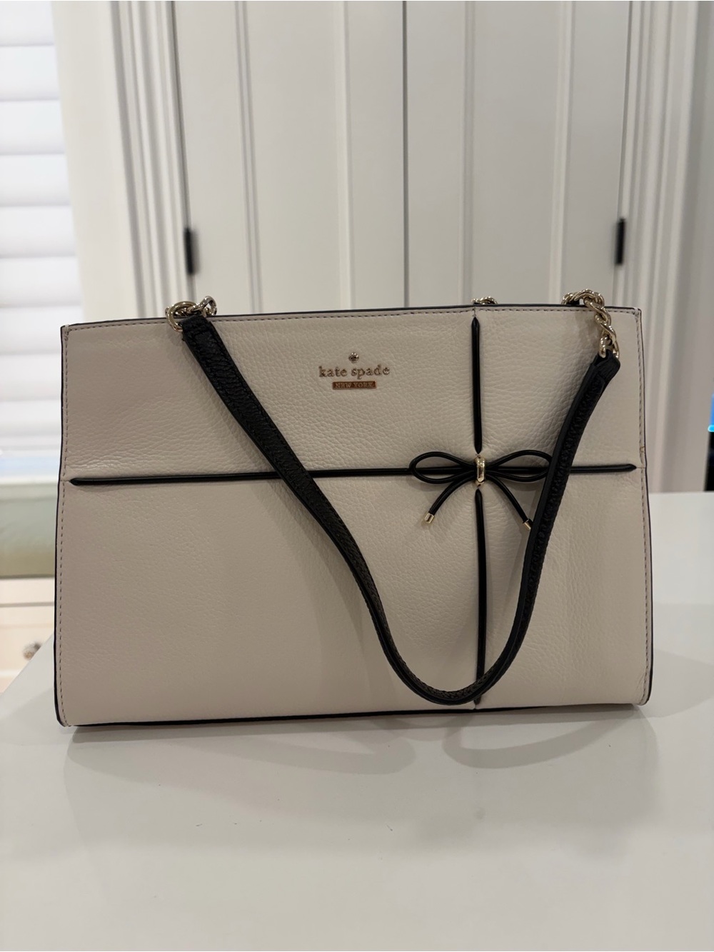 kate spade Cream Shoulder Bag with Black Trim and Bow Detail